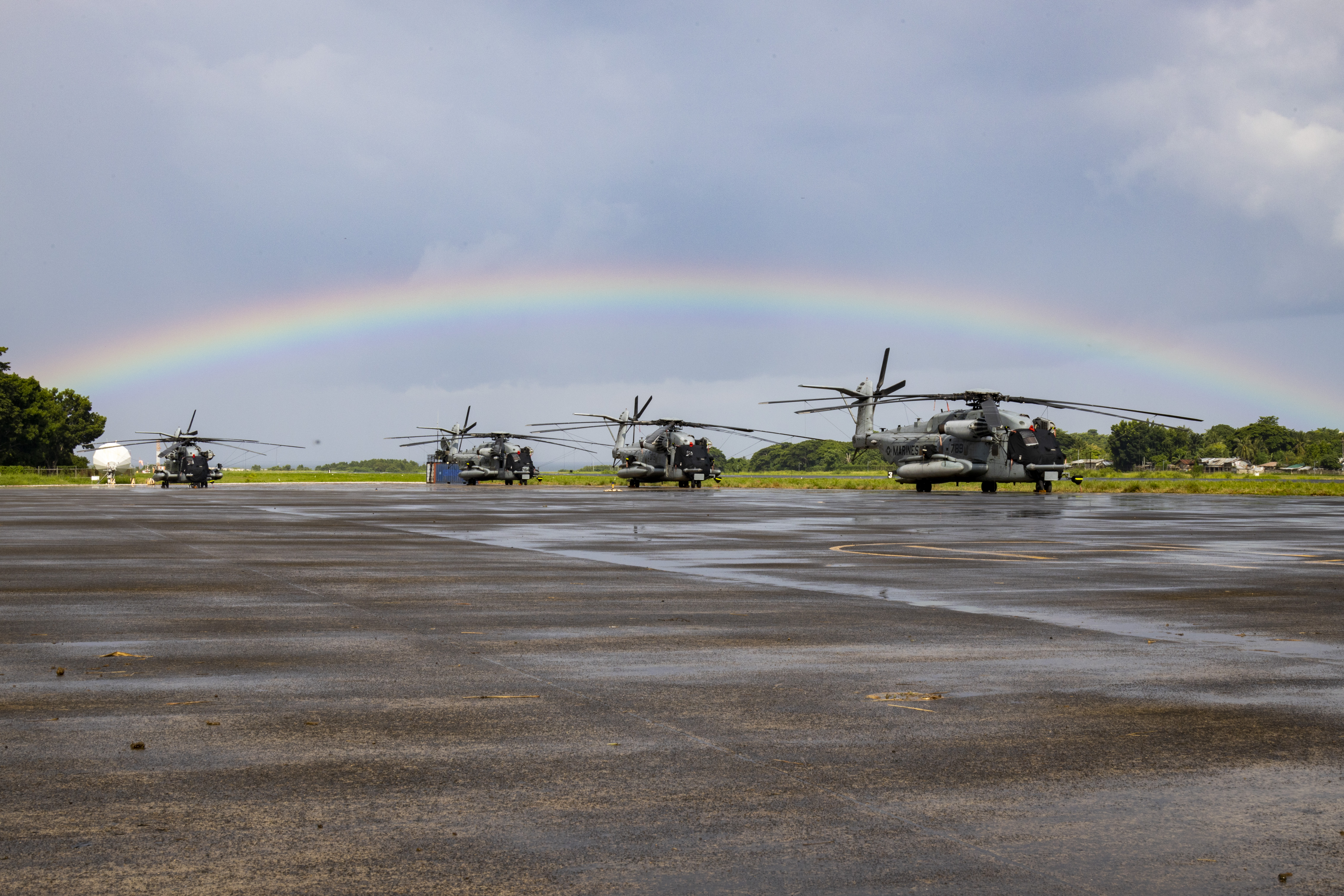 Rainbow Paints the Skyline over CH-53Es in Palawan